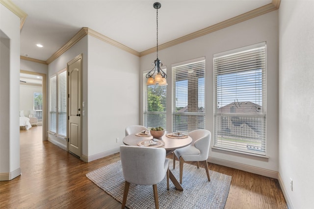 647 Gillon Way, Rockwall, TX 75087 - dining area featuring ornamental molding, baseboards, wood finished floors, and recessed lighting