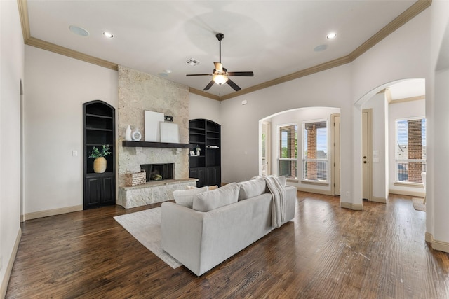 647 Gillon Way, Rockwall, TX 75087 - living room featuring a ceiling fan, ornamental molding, baseboards, built in features, and recessed lighting