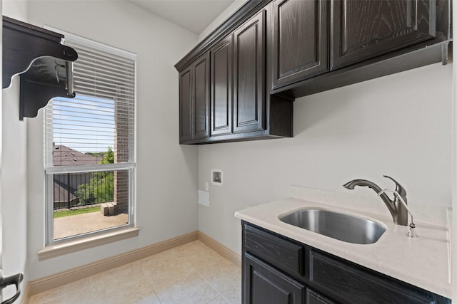 647 Gillon Way, Rockwall, TX 75087 - washroom with hookup for a washing machine, cabinet space, baseboards, and light tile patterned floors