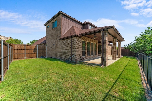 647 Gillon Way, Rockwall, TX 75087 - rear view of property with a ceiling fan, a patio, and brick siding