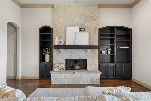 647 Gillon Way, Rockwall, TX 75087 - living area featuring crown molding, wood finished floors, baseboards, built in features, and a large fireplace