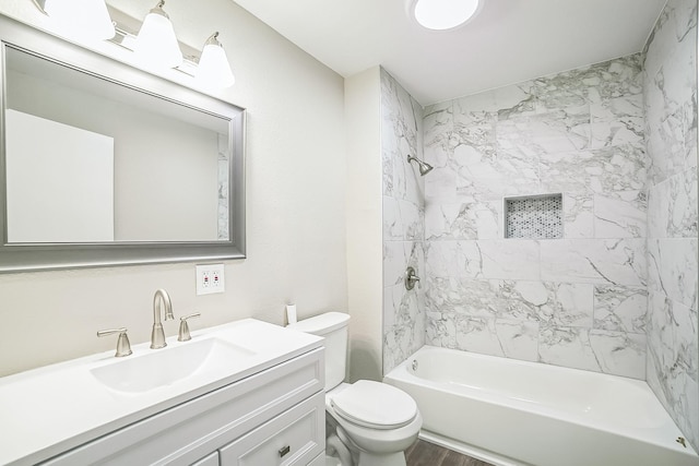 841 20th St SE, Paris, TX 75460 - bathroom with toilet, vanity, shower / washtub combination, and wood finished floors