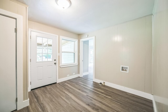 841 20th St SE, Paris, TX 75460 - entryway with dark wood-style floors and baseboards
