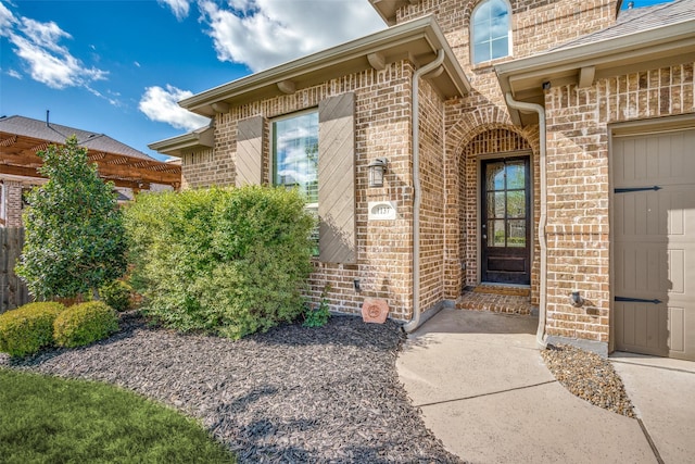 1137 Olympic Dr, Celina, TX 75009 - property entrance featuring brick siding