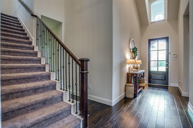 1137 Olympic Dr, Celina, TX 75009 - foyer entrance with a high ceiling, stairway, dark wood-type flooring, and baseboards