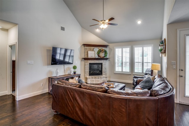 1137 Olympic Dr, Celina, TX 75009 - living area featuring ceiling fan, a stone fireplace, dark wood-type flooring, baseboards, and high vaulted ceiling