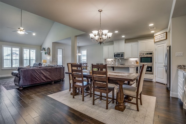 1137 Olympic Dr, Celina, TX 75009 - dining room with a chandelier, ceiling fan, recessed lighting, dark wood finished floors, and baseboards