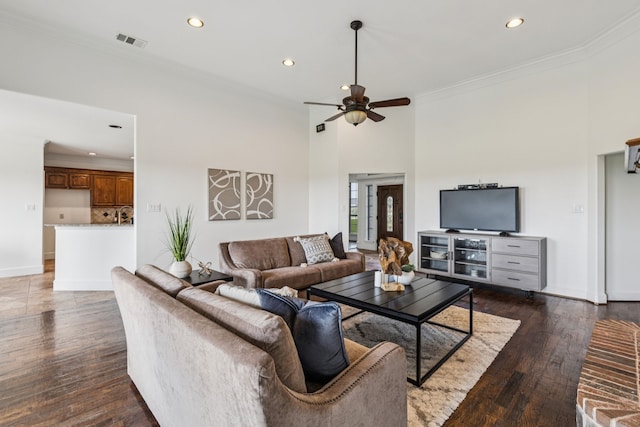 3076 W Alamosa Dr, Terrell, TX 75160 - living room featuring recessed lighting, wood finished floors, ceiling fan, ornamental molding, and baseboards