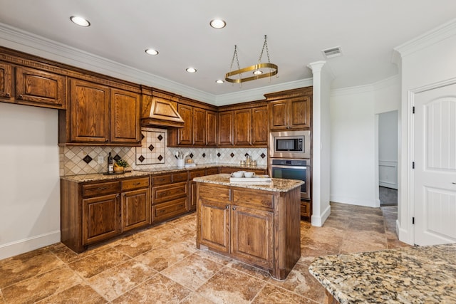3076 W Alamosa Dr, Terrell, TX 75160 - kitchen with appliances with stainless steel finishes, ornamental molding, backsplash, light stone countertops, and a kitchen island