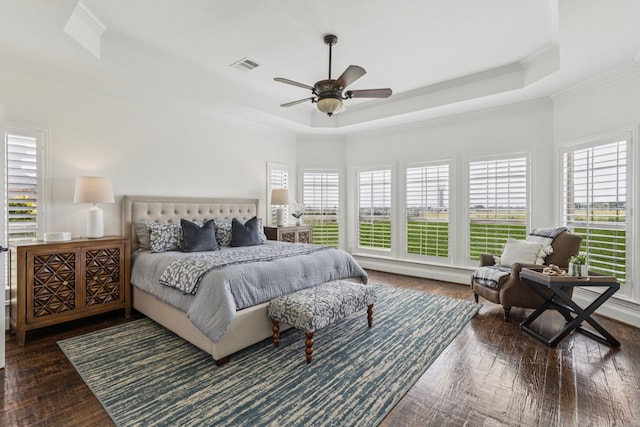 3076 W Alamosa Dr, Terrell, TX 75160 - bedroom featuring a raised ceiling, ornamental molding, wood-type flooring, and ceiling fan