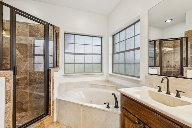 3076 W Alamosa Dr, Terrell, TX 75160 - full bath with vanity, a stall shower, and a whirlpool tub
