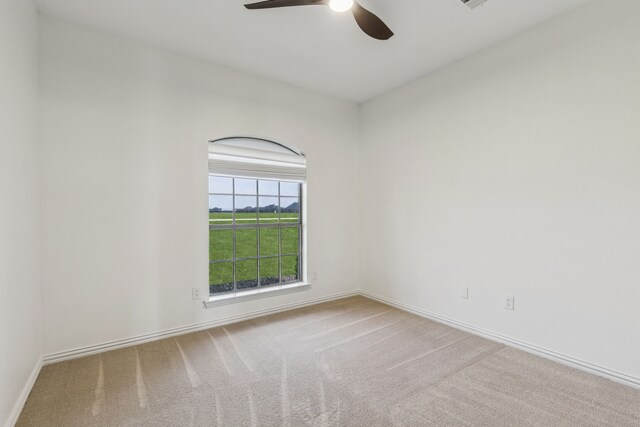 3076 W Alamosa Dr, Terrell, TX 75160 - unfurnished room featuring a ceiling fan, carpet, and baseboards