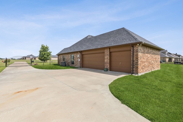 3076 W Alamosa Dr, Terrell, TX 75160 - view of side of home with driveway, brick siding, a gate, a shingled roof, and an attached garage