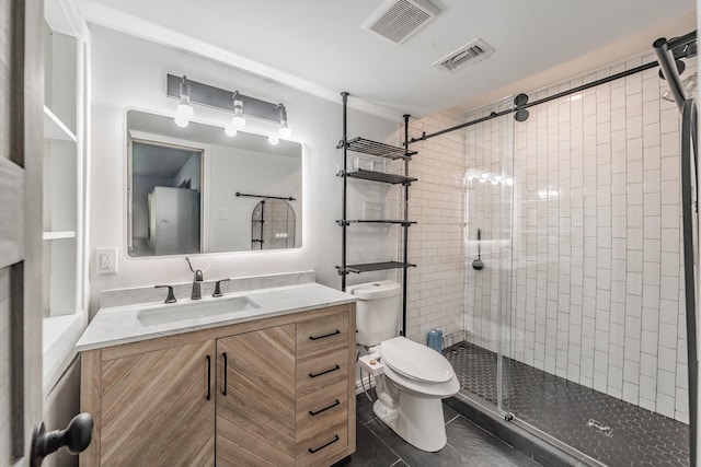 6812 Cumberland Rd, Fort Worth, TX 76116 - bathroom featuring toilet, vanity, a shower stall, and tile patterned floors