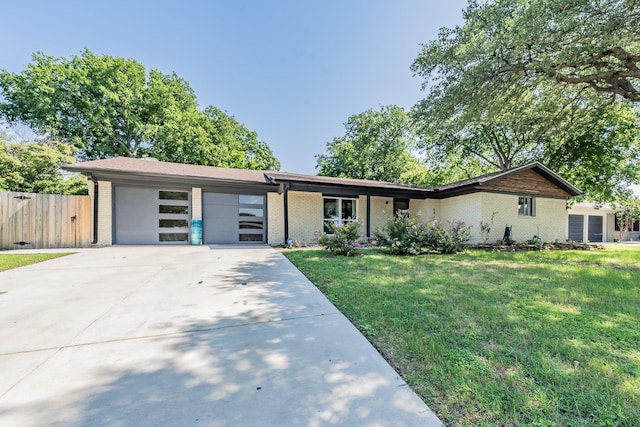 6812 Cumberland Rd, Fort Worth, TX 76116 - view of front of property with brick siding, a garage, and concrete driveway
