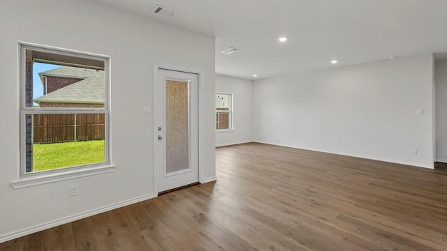 434 Drake Dr, Ferris, TX 75125 - entrance foyer featuring wood finished floors and recessed lighting