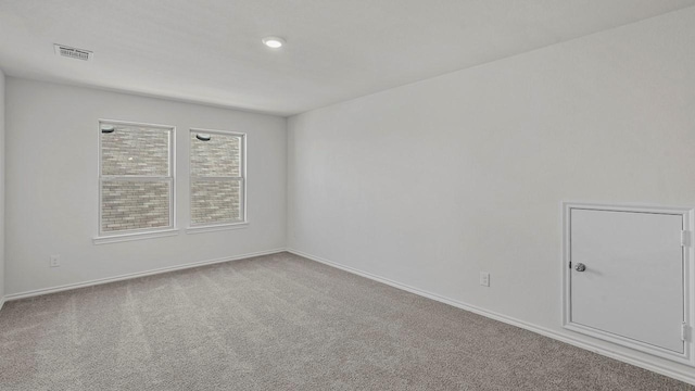 434 Drake Dr, Ferris, TX 75125 - carpeted empty room with baseboards