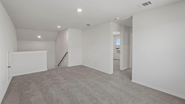 434 Drake Dr, Ferris, TX 75125 - spare room with attic access, carpet flooring, and recessed lighting