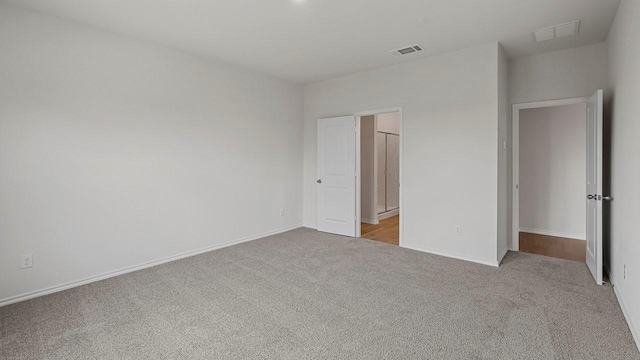 434 Drake Dr, Ferris, TX 75125 - unfurnished bedroom featuring carpet floors and baseboards