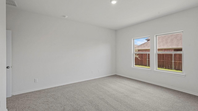 434 Drake Dr, Ferris, TX 75125 - carpeted empty room featuring recessed lighting and a smoke detector