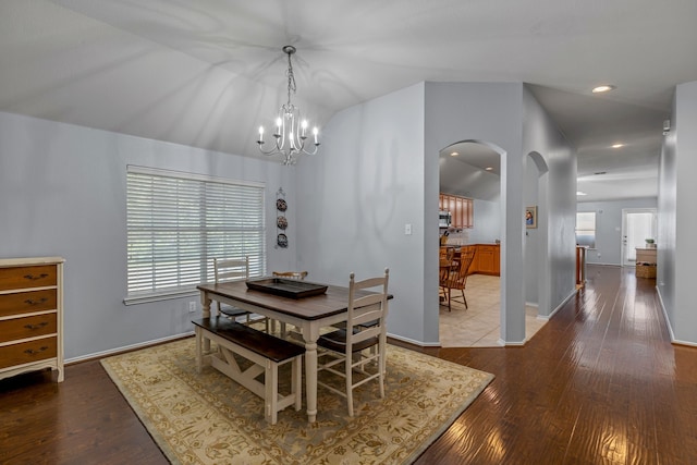 2001 Robincreek Cv, Forney, TX 75126 - dining area featuring arched walkways, a chandelier, hardwood / wood-style floors, and recessed lighting
