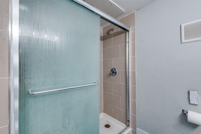 4777 Cedar Springs Rd Unit 8Q, Dallas, TX 75219 - bathroom featuring a stall shower