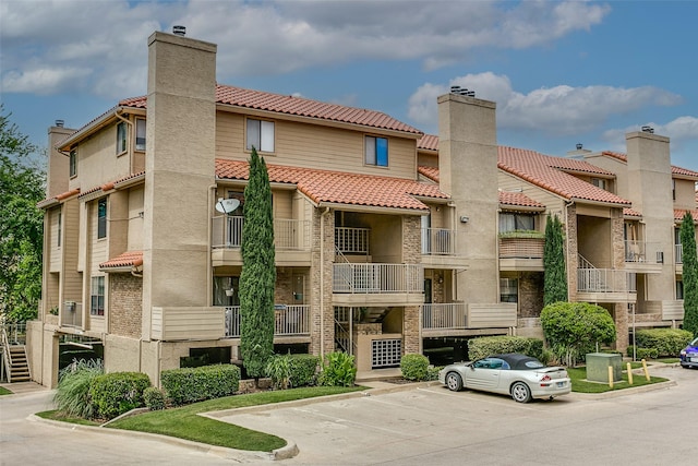 4777 Cedar Springs Rd Unit 8Q, Dallas, TX 75219 - view of property with uncovered parking