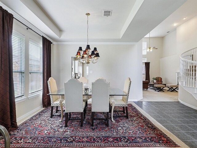 2937 Oakland Hills Dr, Plano, TX 75025 - dining space featuring a chandelier and a raised ceiling