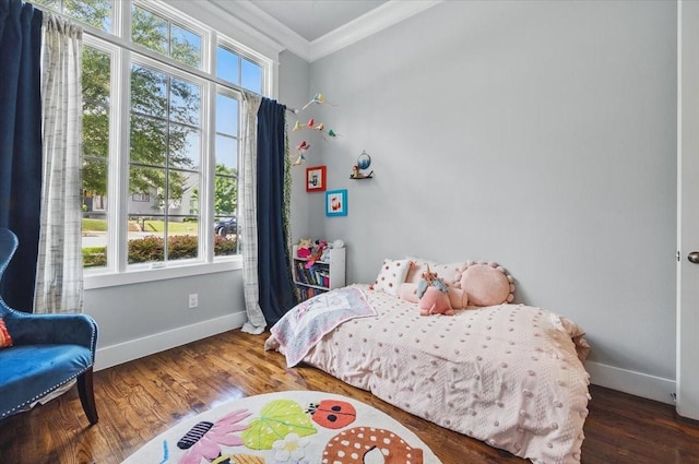 3770 W 5th St, Fort Worth, TX 76107 - bedroom with ornamental molding, baseboards, and wood finished floors