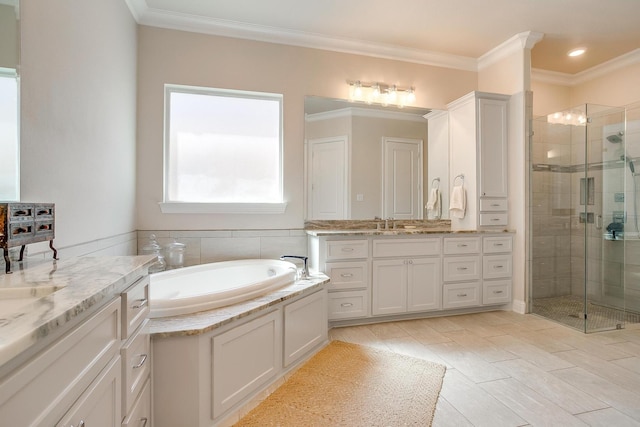 604 Rockfall Way, Aledo, TX 76008 - full bathroom featuring a shower stall, vanity, a garden tub, and ornamental molding