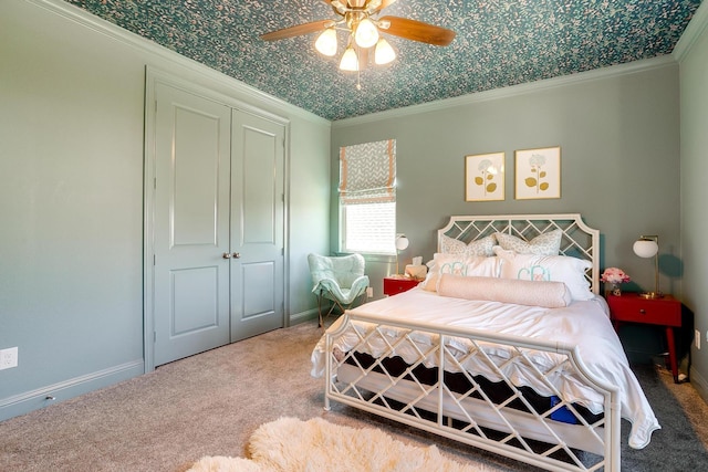 604 Rockfall Way, Aledo, TX 76008 - bedroom featuring carpet floors, a closet, baseboards, ceiling fan, and crown molding