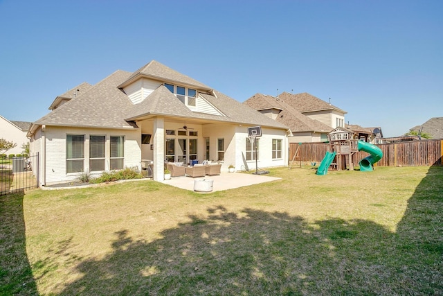 604 Rockfall Way, Aledo, TX 76008 - back of house featuring an outdoor hangout area, a patio area, a playground, ceiling fan, and brick siding