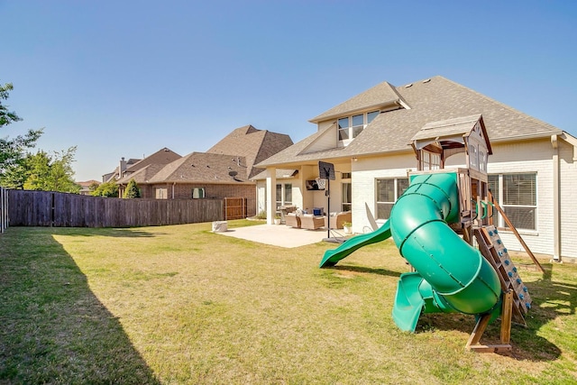 604 Rockfall Way, Aledo, TX 76008 - back of property featuring brick siding, a playground, a shingled roof, and a patio