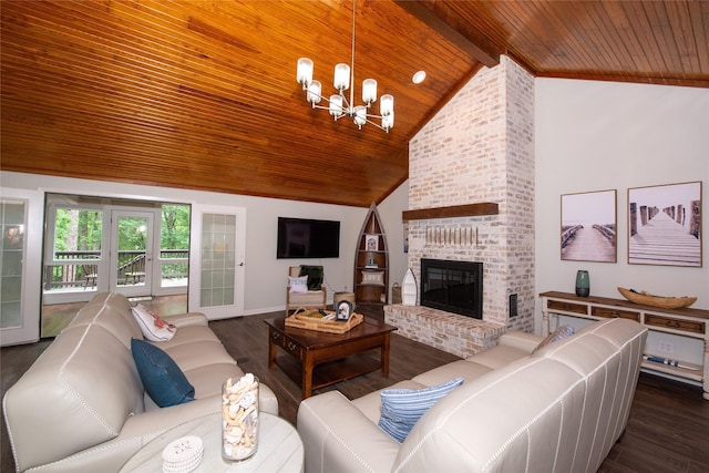 303 Llano Bnd, Holly Lake Ranch, TX 75765 - living area featuring a wooden ceiling with exposed beams, a chandelier, dark wood-type flooring, a brick fireplace, and high vaulted ceiling