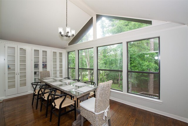 303 Llano Bnd, Holly Lake Ranch, TX 75765 - dining area with a chandelier and wood finished floors