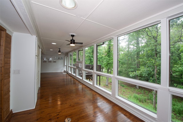 303 Llano Bnd, Holly Lake Ranch, TX 75765 - unfurnished sunroom with hardwood / wood-style flooring and recessed lighting