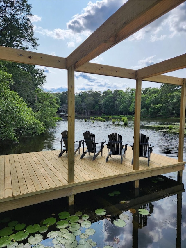 303 Llano Bnd, Holly Lake Ranch, TX 75765 - dock area with a water view and a forest view
