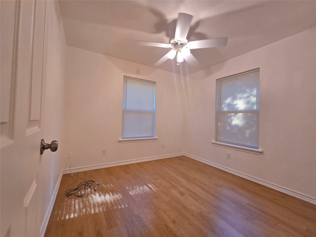 201 Paschal, Troup, TX 75789 - spare room featuring wood finished floors, baseboards, and ceiling fan