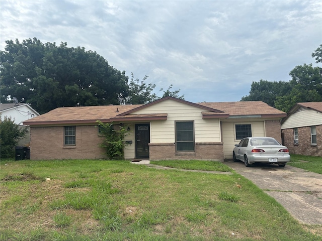 2730 Eastbrook Dr, Mesquite, TX 75150 - ranch-style house featuring brick siding, a front yard, and driveway