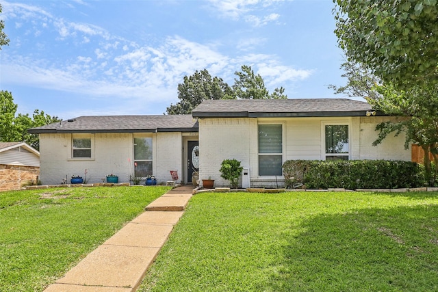 2622 Briar Hill Dr, Carrollton, TX 75007 - single story home with a front lawn, brick siding, and a shingled roof