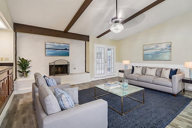 2622 Briar Hill Dr, Carrollton, TX 75007 - living area with a ceiling fan, wood finished floors, and a fireplace