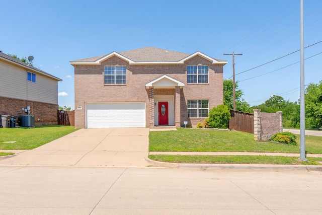 2300 Ash Grove Trl, Fort Worth, TX 76112 - traditional home with a garage, driveway, brick siding, and central AC