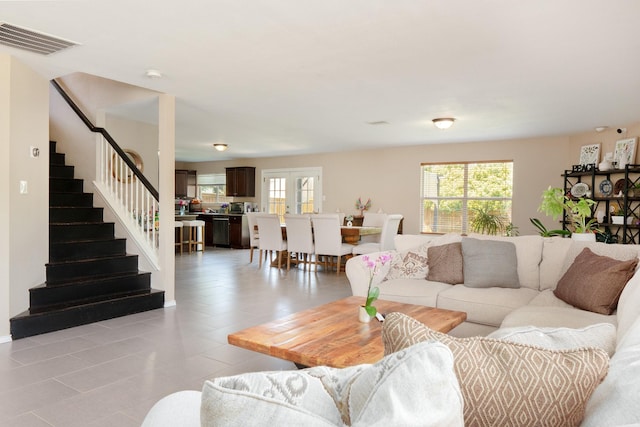 2300 Ash Grove Trl, Fort Worth, TX 76112 - living area featuring stairway and light tile patterned floors
