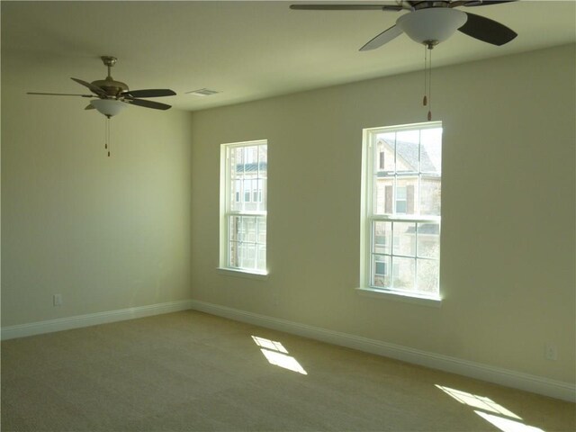 6813 Royal View Dr, Mckinney, TX 75070 - empty room featuring plenty of natural light, ceiling fan, and baseboards