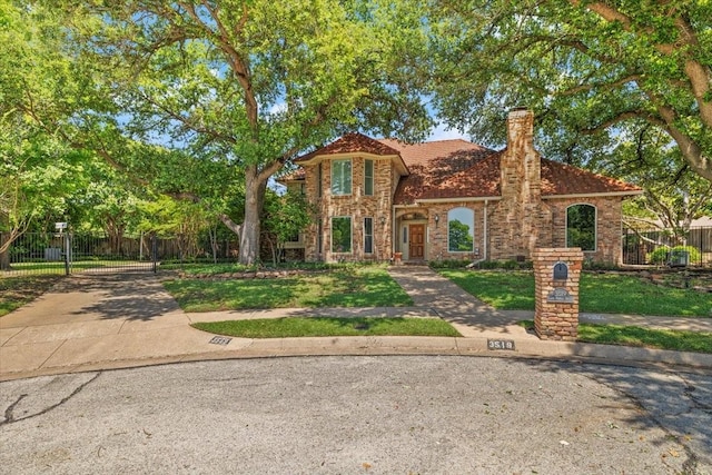 3519 Lake Powell Dr, Arlington, TX 76016 - mediterranean / spanish house with a chimney