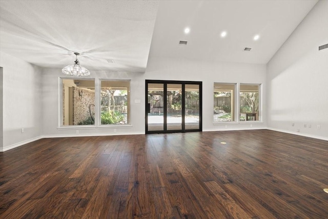 3519 Lake Powell Dr, Arlington, TX 76016 - unfurnished living room featuring a chandelier, high vaulted ceiling, wood finished floors, baseboards, and recessed lighting