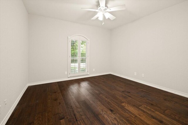 3519 Lake Powell Dr, Arlington, TX 76016 - unfurnished room with dark wood finished floors, baseboards, and ceiling fan
