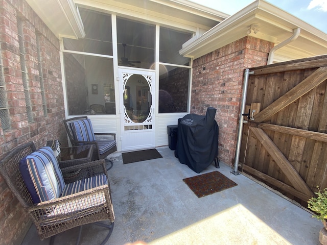 2900 Boyd St, Ennis, TX 75119 - entrance to property featuring brick siding, a patio, and a gate