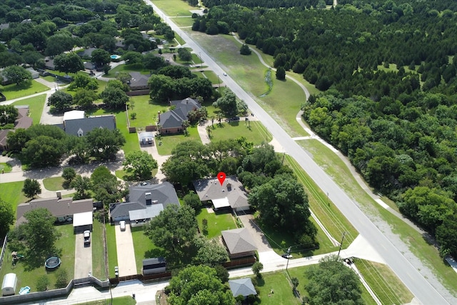 201 Harris Dr, Sunnyvale, TX 75182 - aerial overview of property's location featuring nearby suburban area and a heavily wooded area