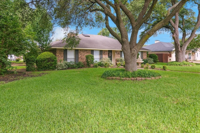 201 Harris Dr, Sunnyvale, TX 75182 - ranch-style home with a front lawn and brick siding